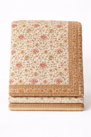 Jaipuri hand block printed cotton quilt with cream base and floral pattern