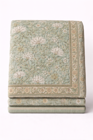 Jaipuri hand block printed cotton quilt with sea green base and floral pattern